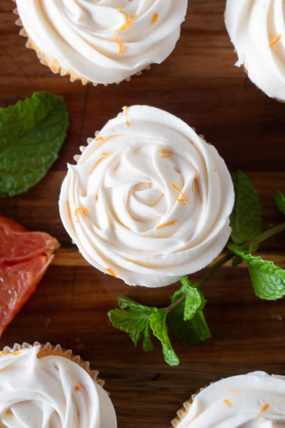 frosting cupcake swirl with zest close up.