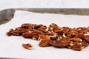 pecans on baking sheet