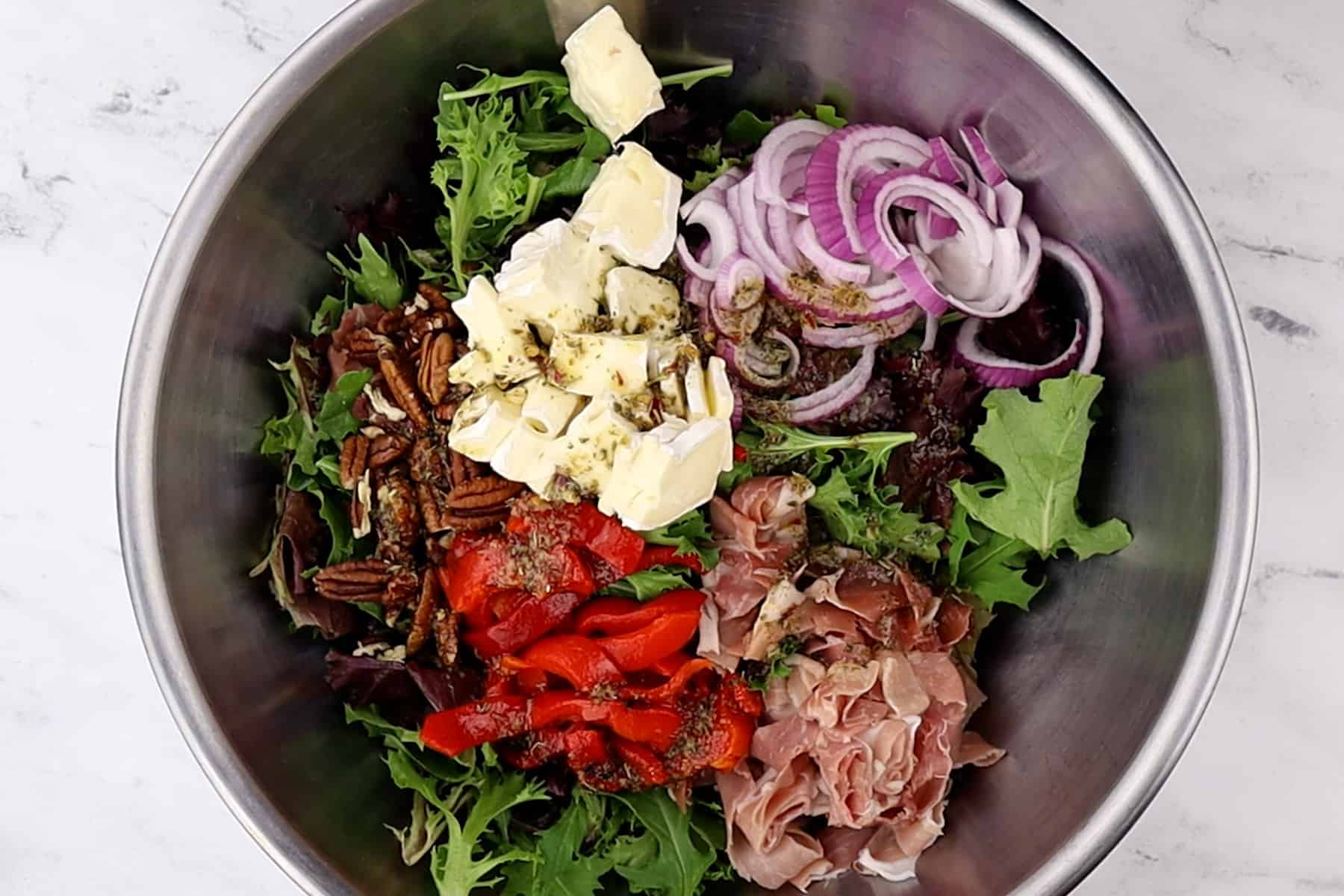 all ingredients for salad in large mixing bowl