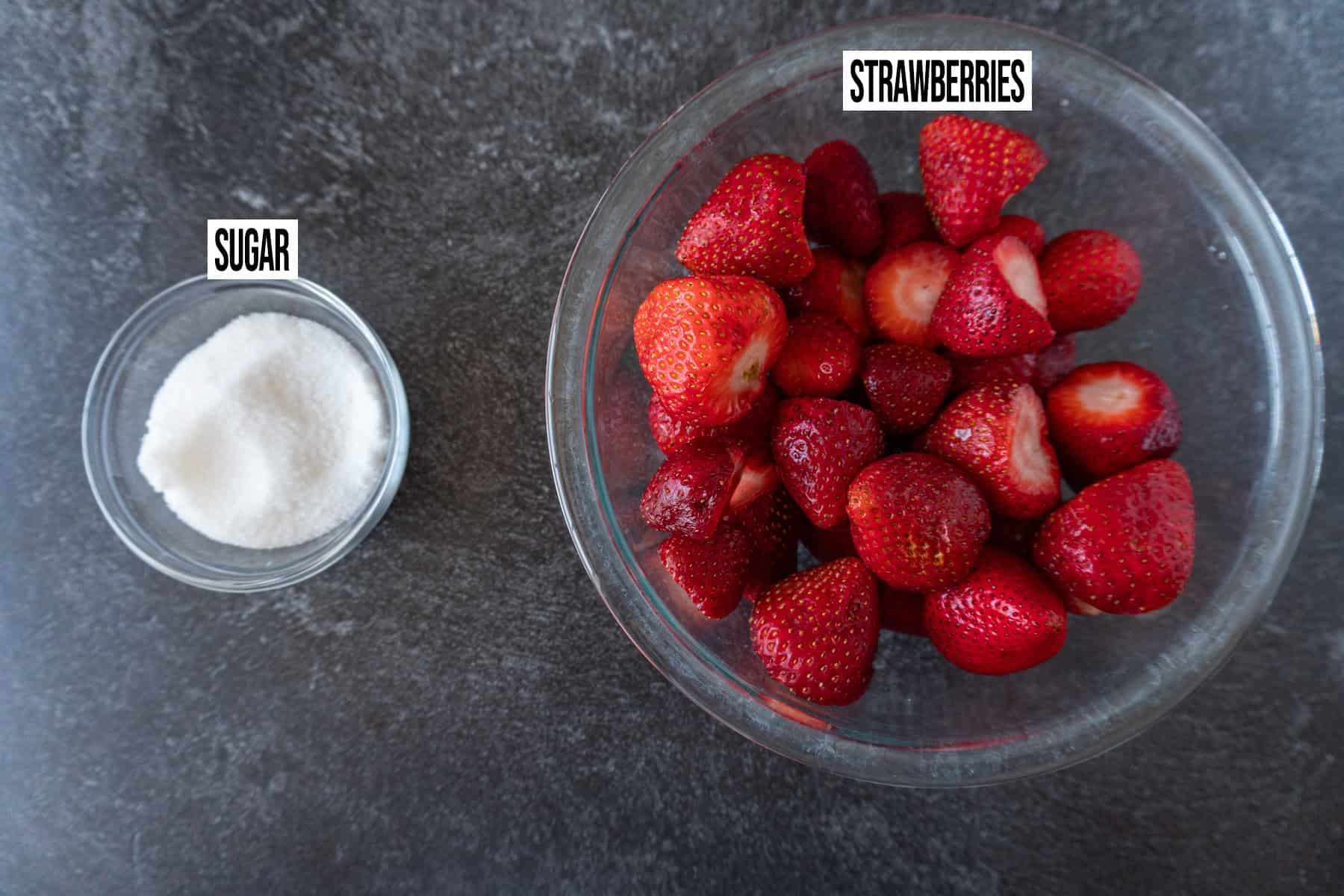 strawberry filling ingredients in individual bowls and labeled.