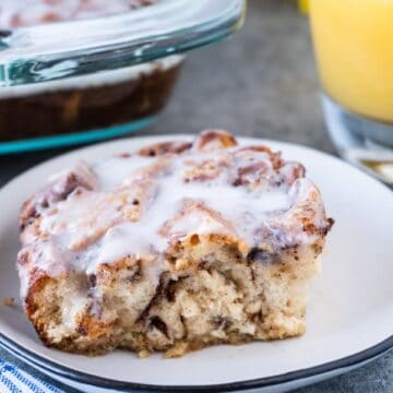 Cinnamon Roll French Toast smells amazing when baking and tastes even better! #cinnamonroll #frenchtoast #atablefullofjoy #breakfast #forkids #easytomake #cinnamon