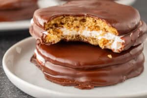 moon pie on plate with piece bitter out.