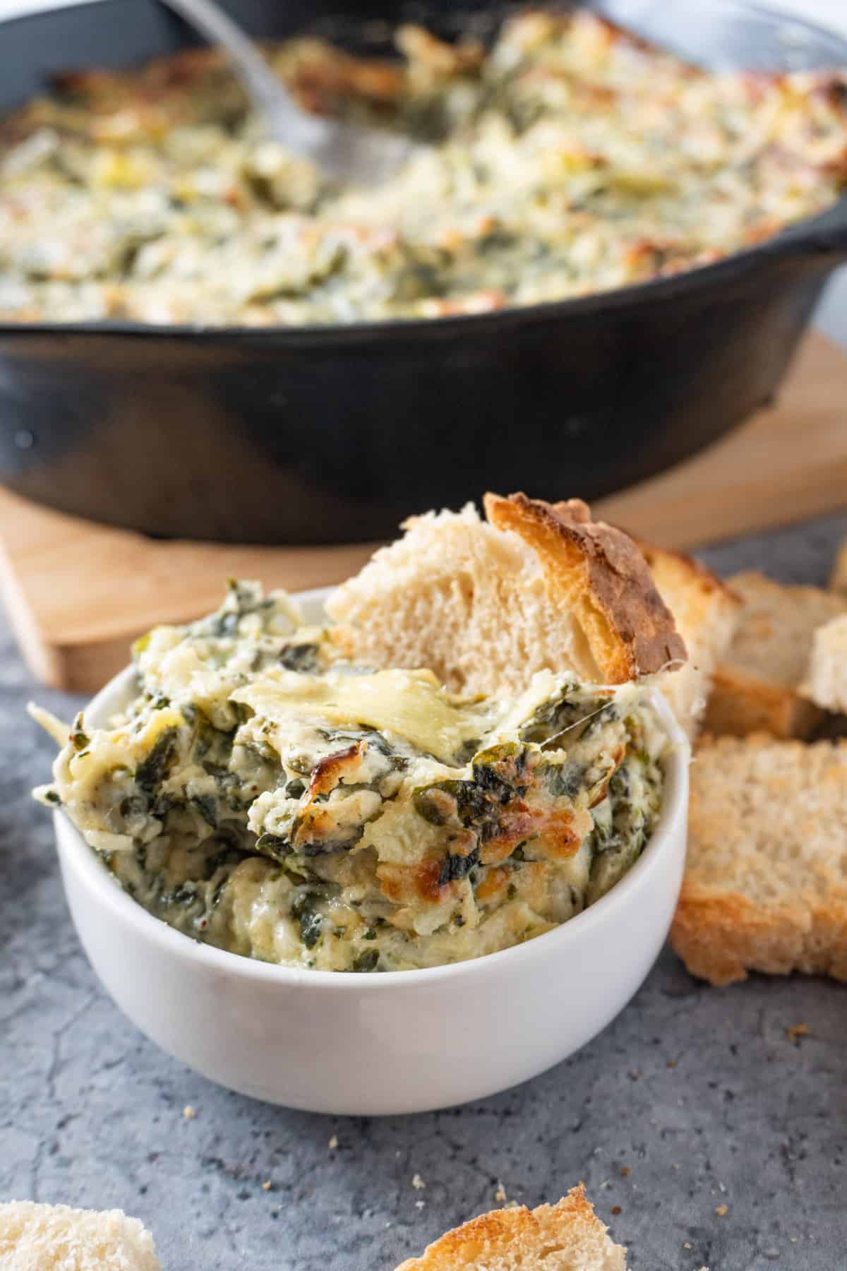 Hot Spinach Artichoke Dip in small bowl