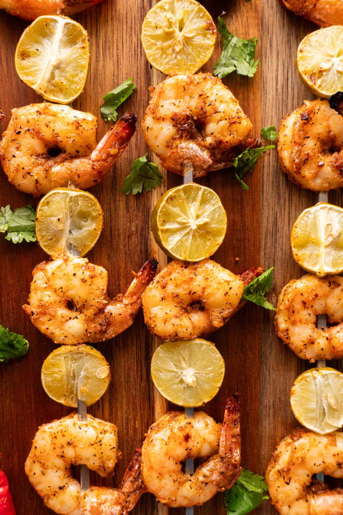 skewered shrimp on cutting board