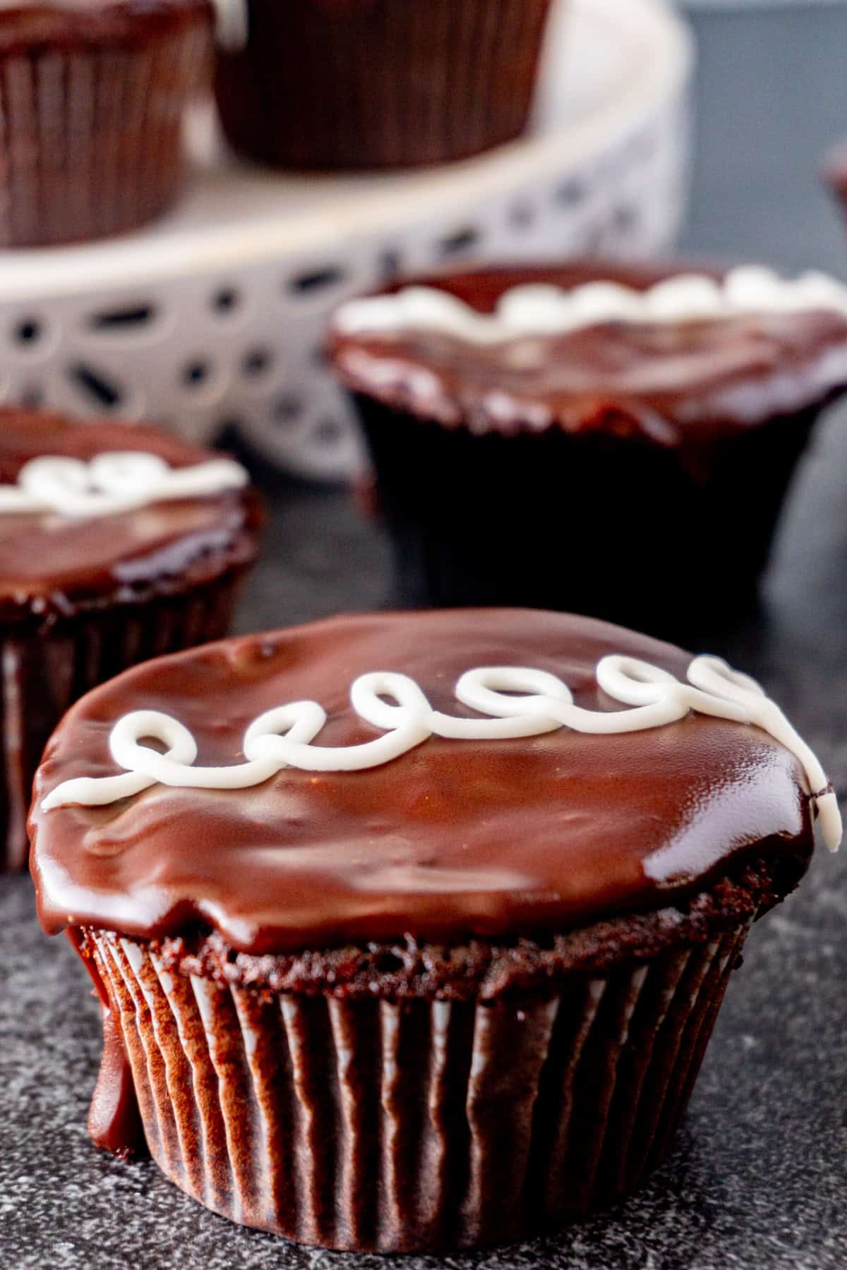 Cream Filled Chocolate cupcake with ganache topping close up