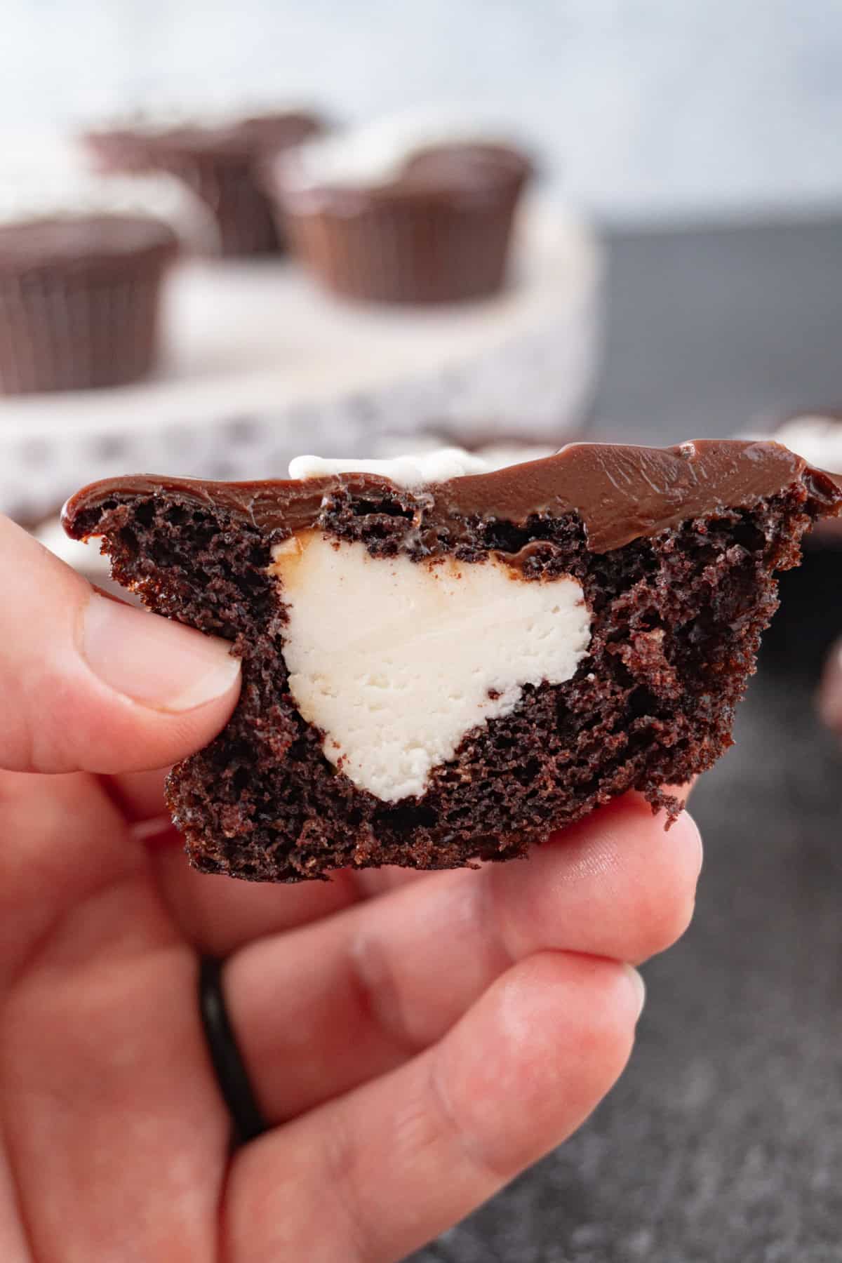 cupcake halved to show filled center.