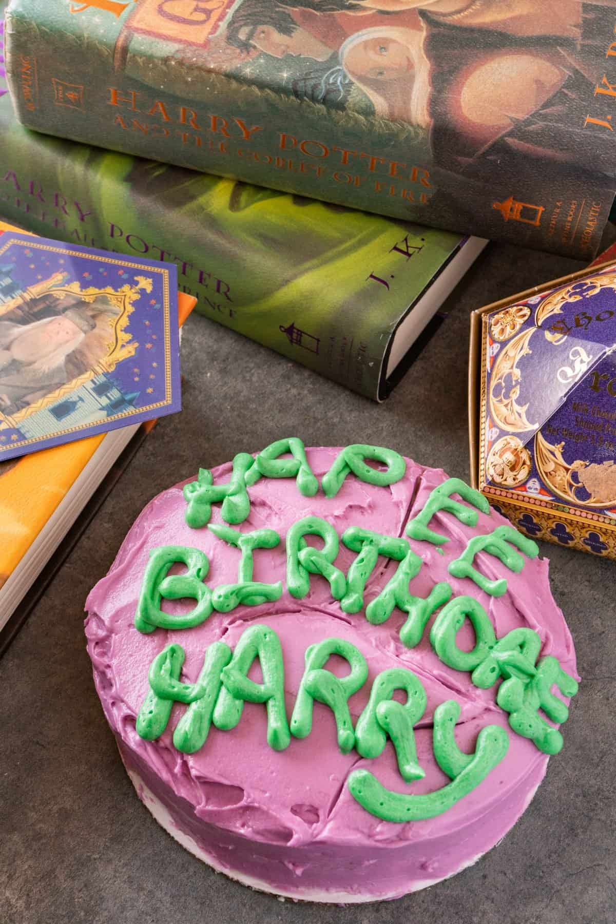 harry potter birthday cake with books nearby