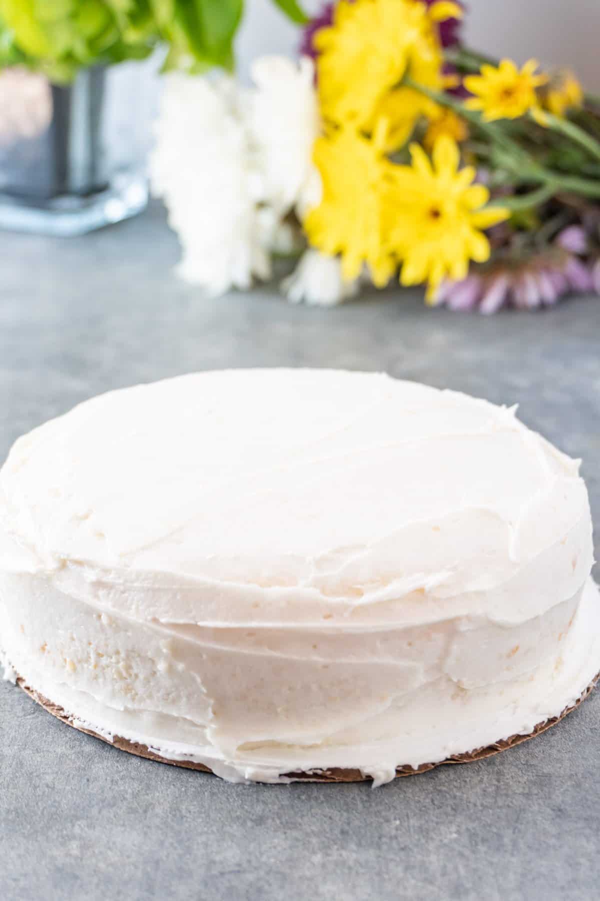 cake with vanilla crumb coat