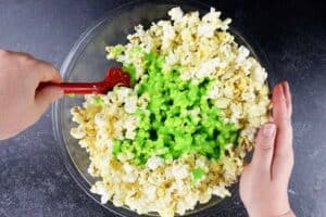 mixing the marshmallow and popcorn