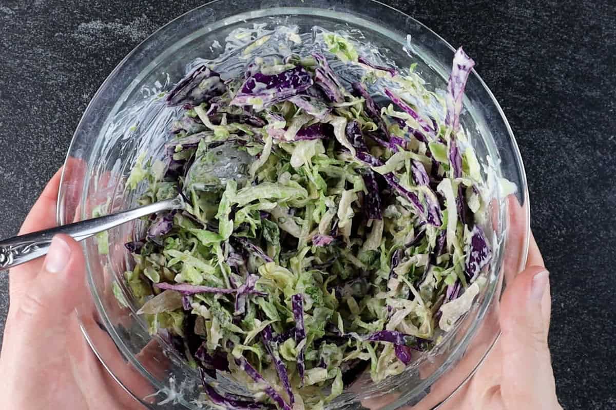 cliantro lime slaw mixed in bowl