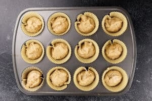 cupcakes in tin before baking