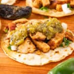 chicken street tacos with salsa.