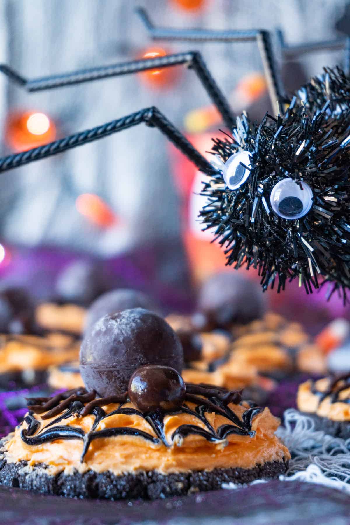 Halloween Spider Cookies with a fake spider next to them