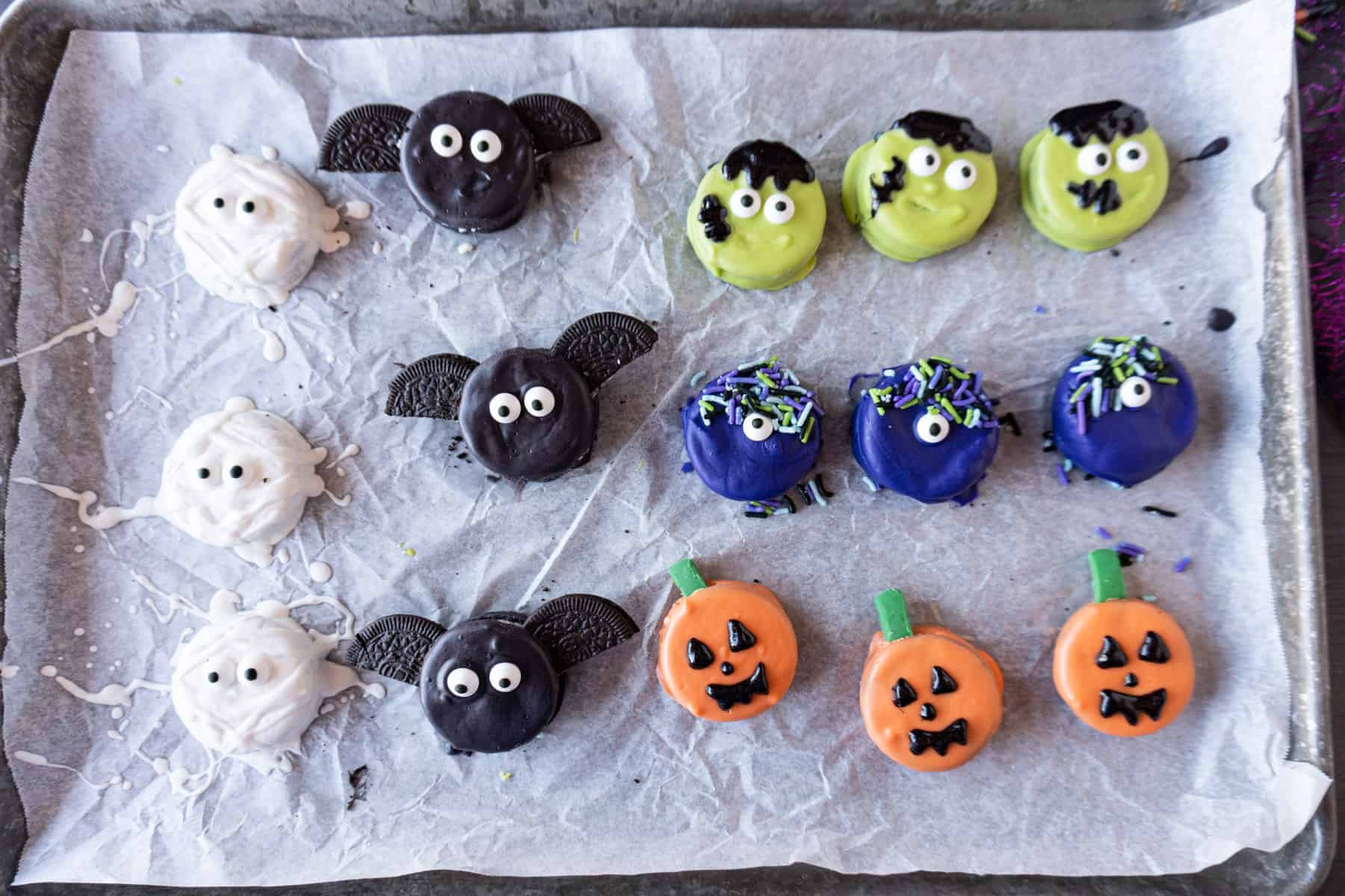 oreo halloween treats on parchment lined baking sheet