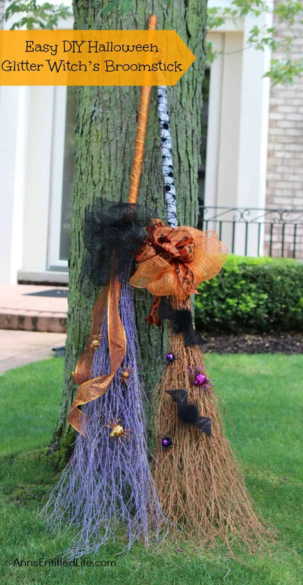 diy witches brooms leaning on trees