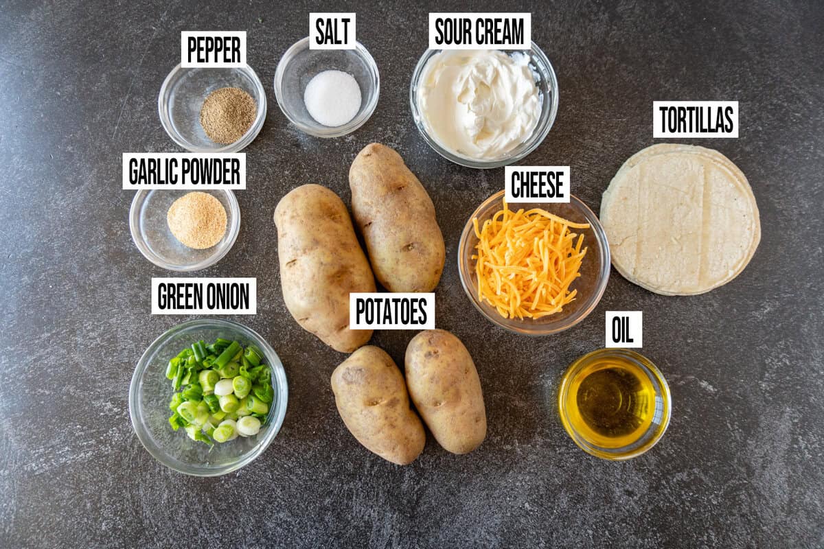potato taco ingredients are in individual bowls and labeled.
