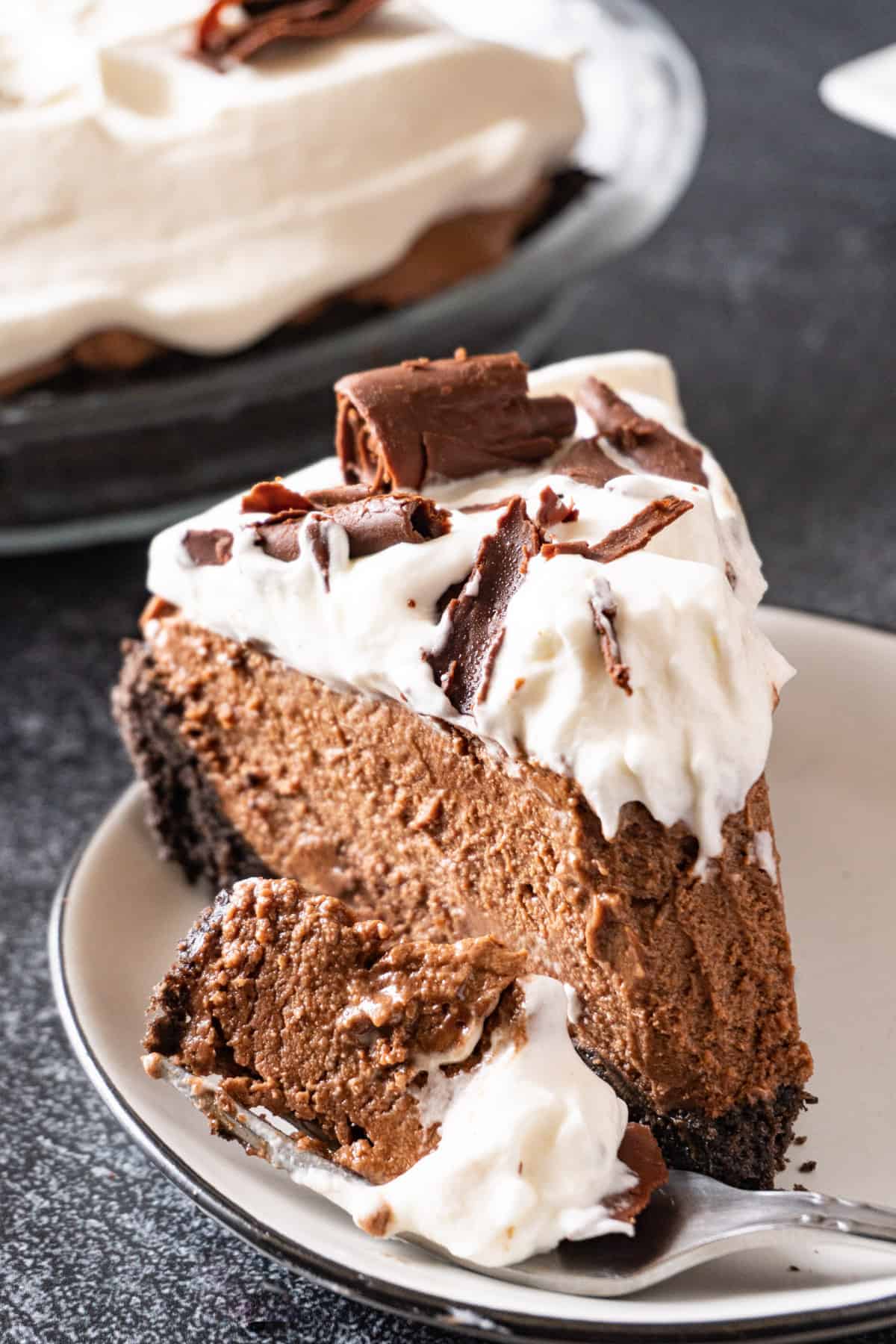 French Silk Chocolate Pie with a bite taken out of it