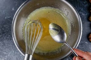 egg mixture coating the back of a spoon