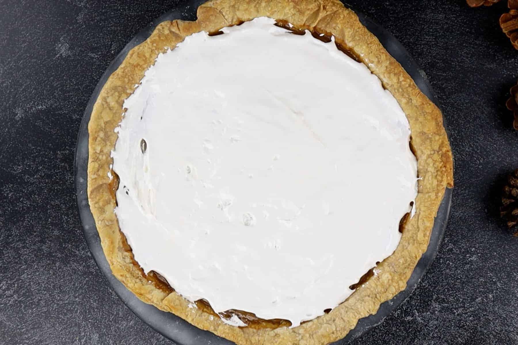 Sweet Potato Pie with marshmallow fluff spread on it- before toasting.