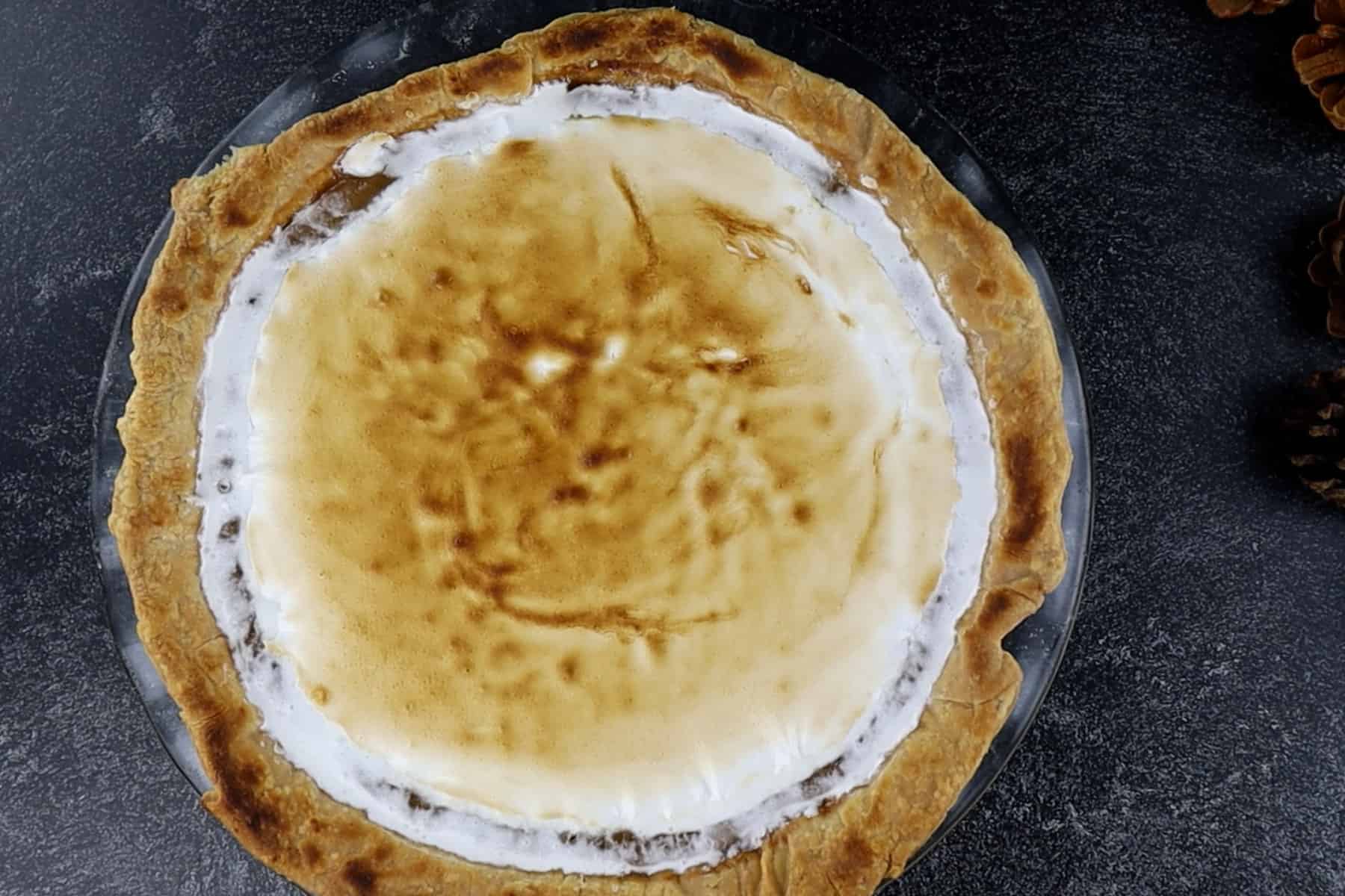 Sweet Potato Pie with toasted marshmallow fluff on top.