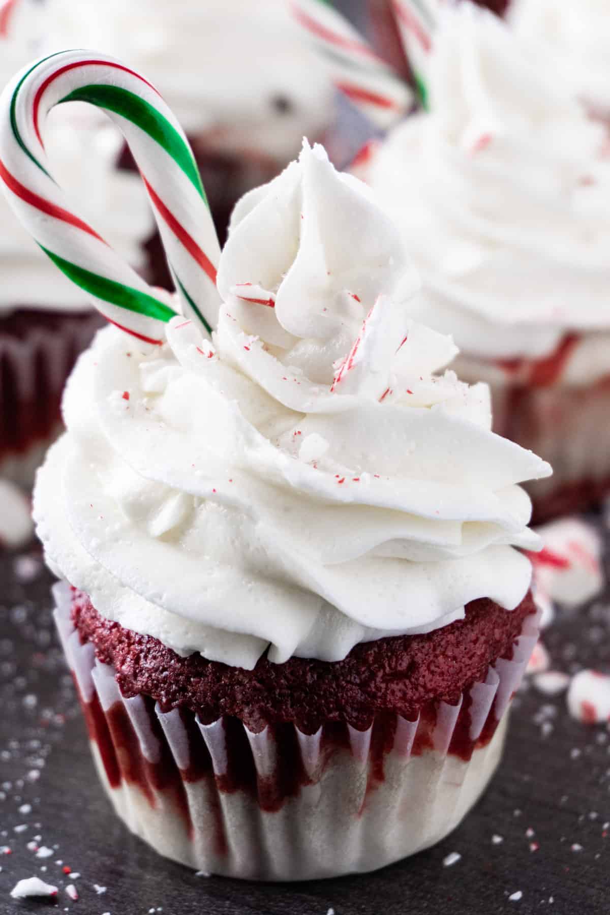 Peppermint cupcake close up with mini candy cane frosting