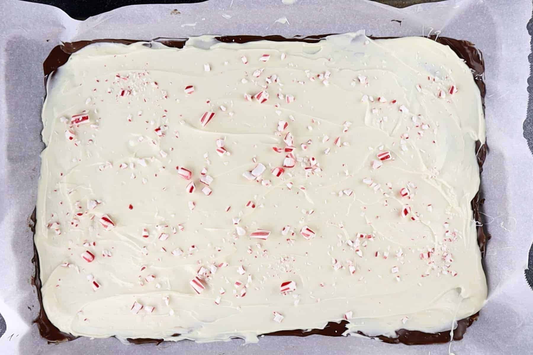 peppermint bark with crushed candy canes after it as chilled and is completely set.
