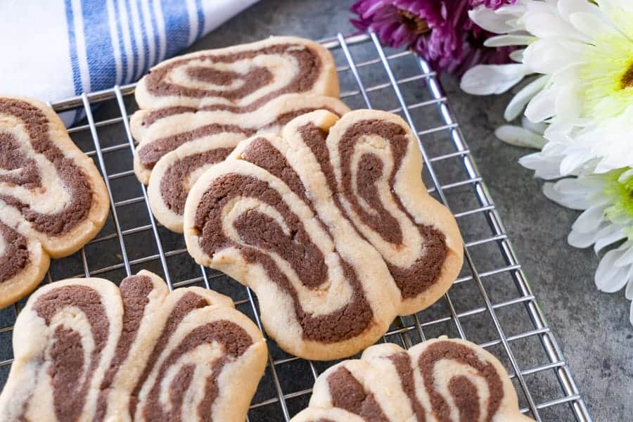 Butterfly Cookies -These tasty peanut butter and chocolate sugar cookies are fun to make and great for Spring! These butterfly cookies are a delicious spin on a classic sugar cookie recipe! #peantunbuttercookie #atablefullofjoy #sugarcookie #butterflycookie #forkids #babyshower #easy #simple #tutorial