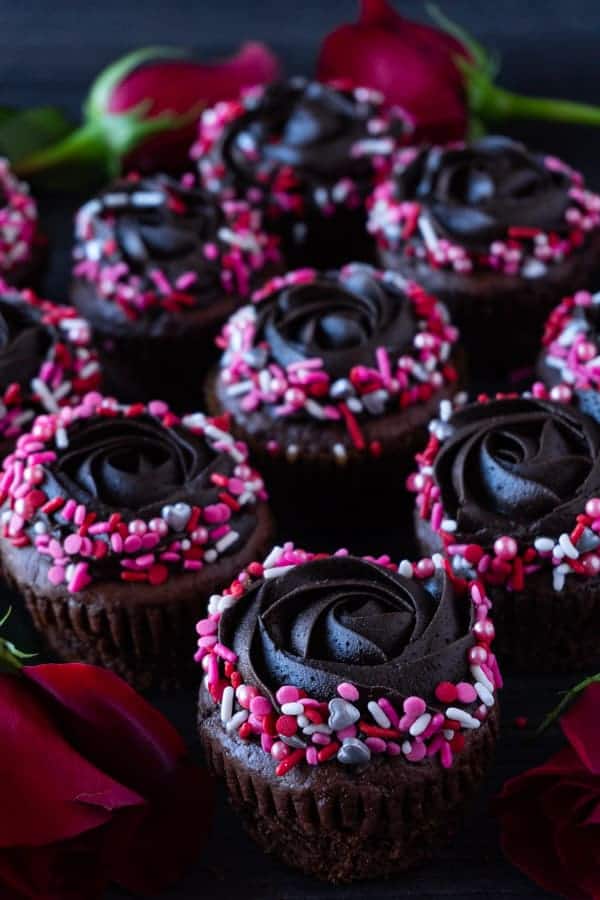 Valentines Cupcakes- an easy treat for your sweet heart! Who doesn’t love a yummy chocolate Valentines cupcake! #valentinesday #valentinescupcake #sprinkles #easy #chocolate #forkids #cute #forschool #vday #cupcakes #atablefullofjoy #valentinesdessert