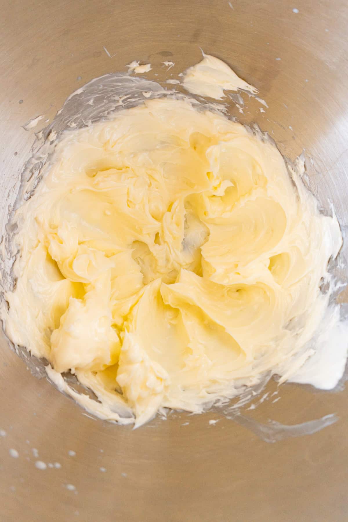 butter whipped in metal mixing bowl.
