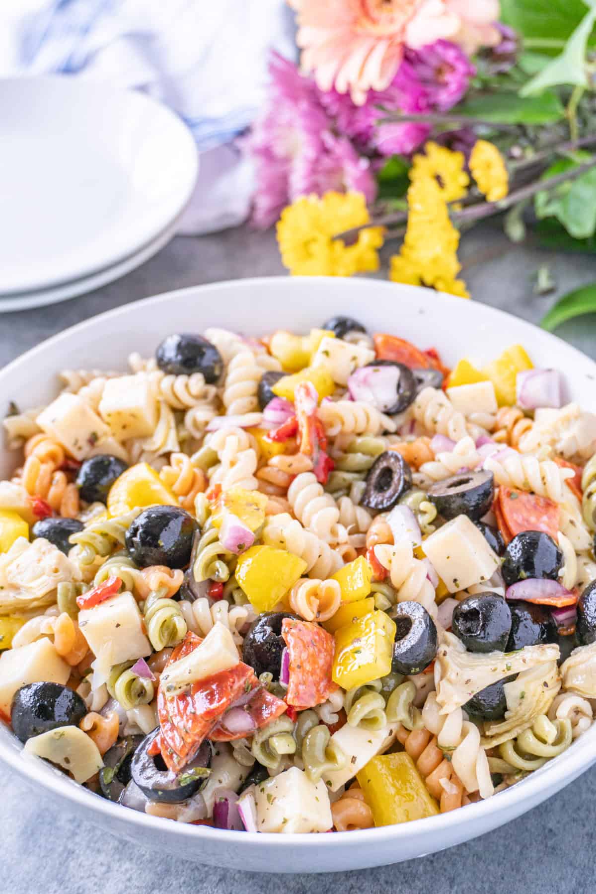 pepperoni pasta salad in large white bowl