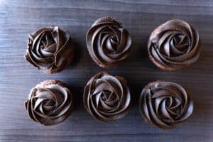 cupcakes frosted with dark chocolate buttercream