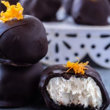 Vegan Truffles,These creamy orange vegan truffles are a delicious treat that are dairy free, bursting with delicious orange flavor, and the perfect sweetness. #truffle #cashewcream #dairyfree #df #gf #glutenfree #paleo #cashew #orange #atablefullofjoy #orangecream #maplesyrup #chocolate #raw #healthy