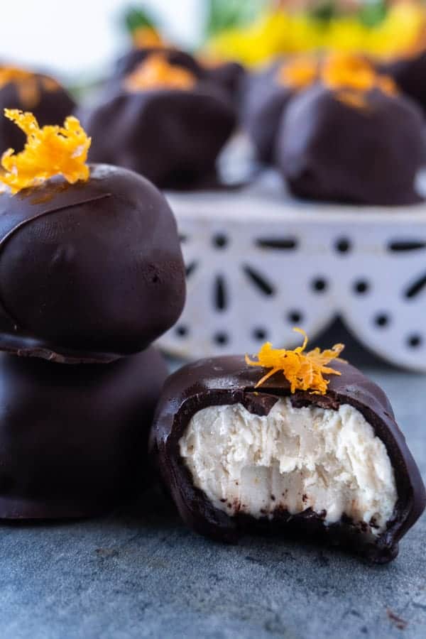 Vegan Truffles,These creamy orange vegan truffles are a delicious treat that are dairy free, bursting with delicious orange flavor, and the perfect sweetness. #truffle #cashewcream #dairyfree #df #gf #glutenfree #paleo #cashew #orange #atablefullofjoy #orangecream #maplesyrup #chocolate #raw #healthy