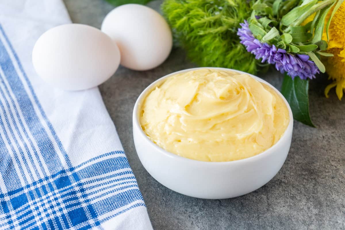 mayo in bowl next to eggs