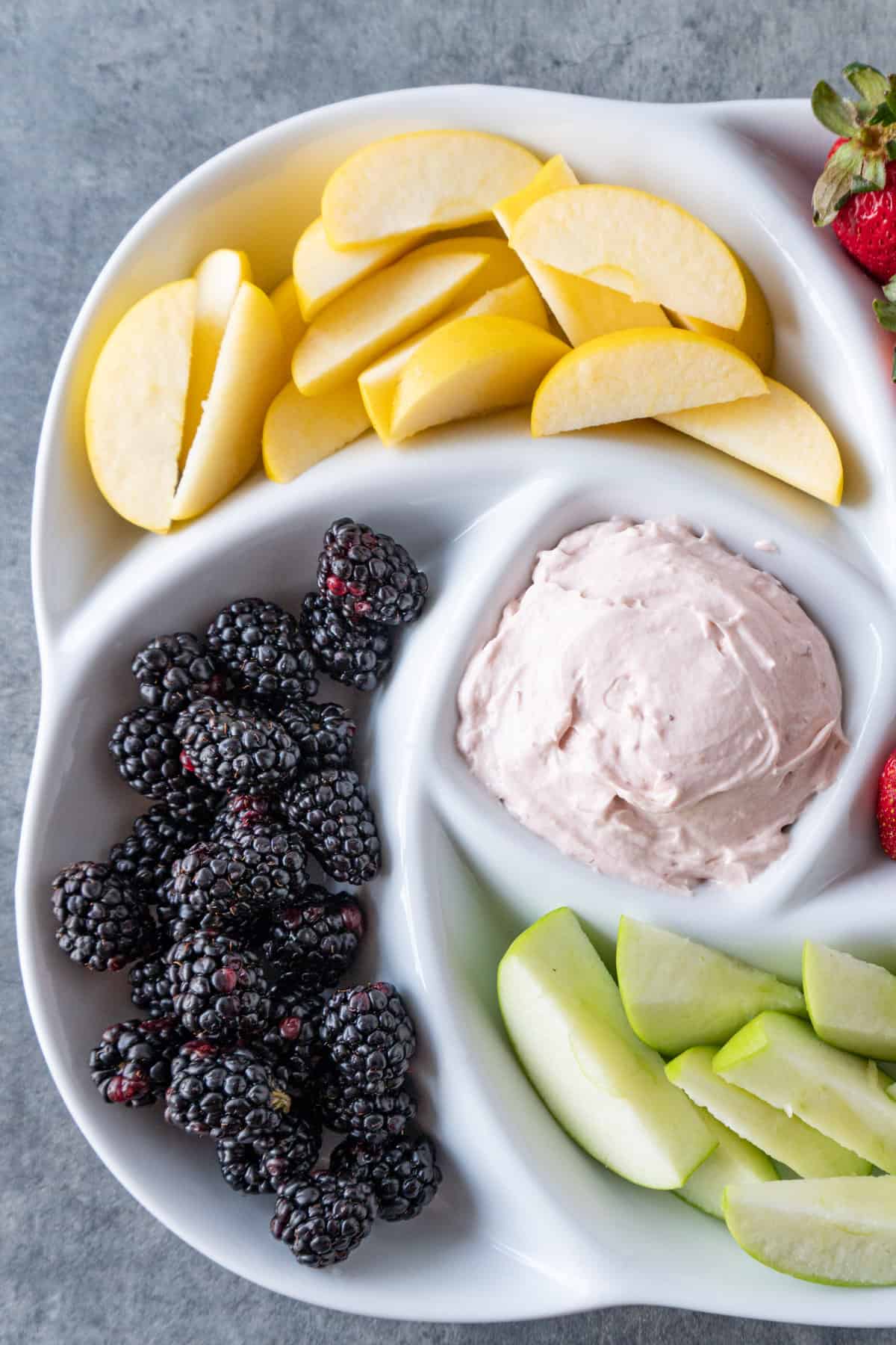 apples and blackberries on platter iwth dip