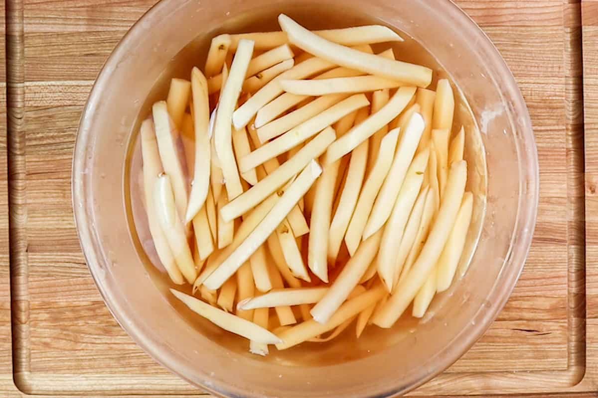 potatoes in water after soaking for 12 hrs- water is pink