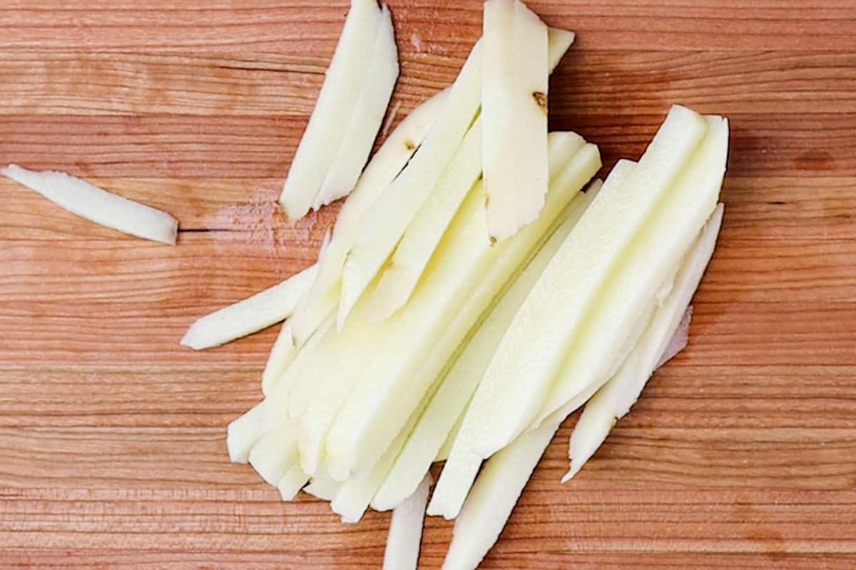 potatoes sliced into fries