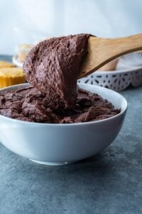 Chocolate Frosting on a wooden spoon