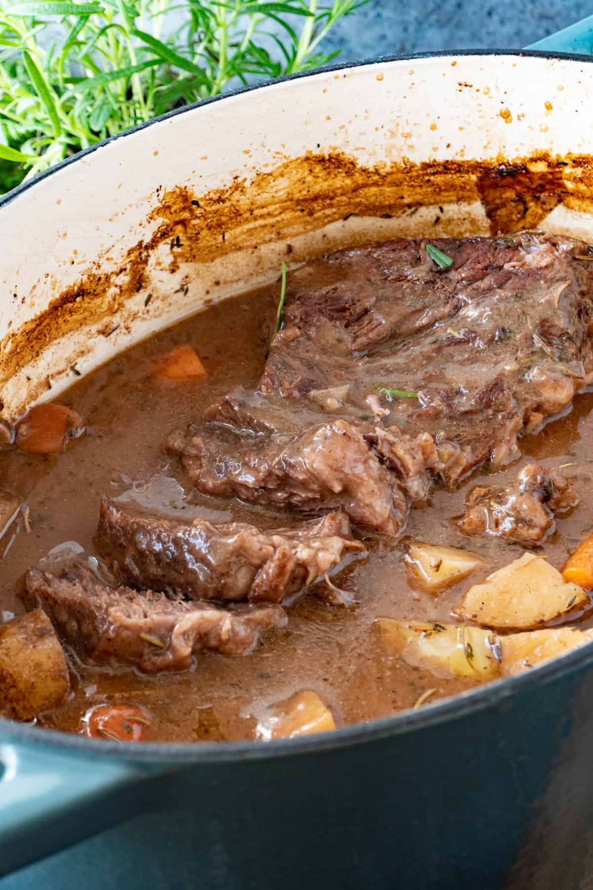 sliced chuck roast in dutch oven