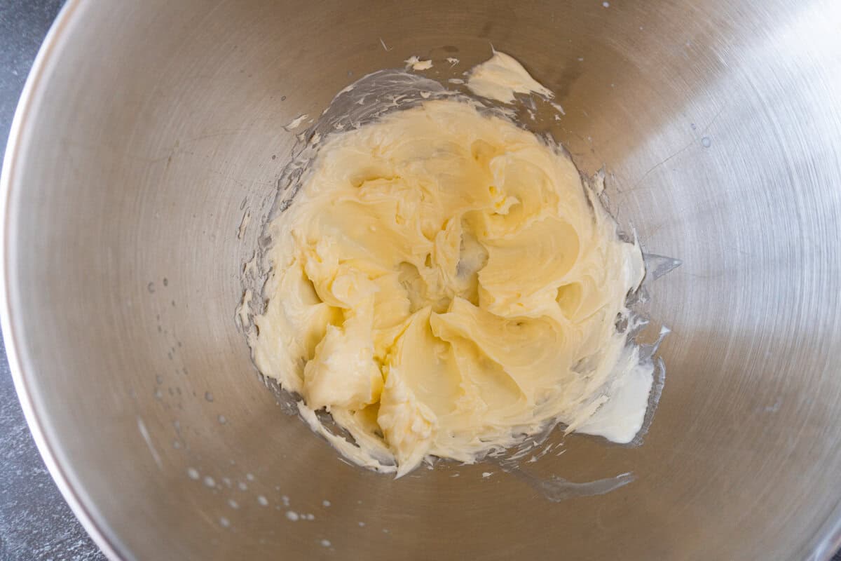 whipped butter in metal bowl.