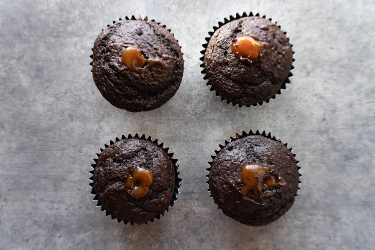 cupcakes with caramel filling the holes