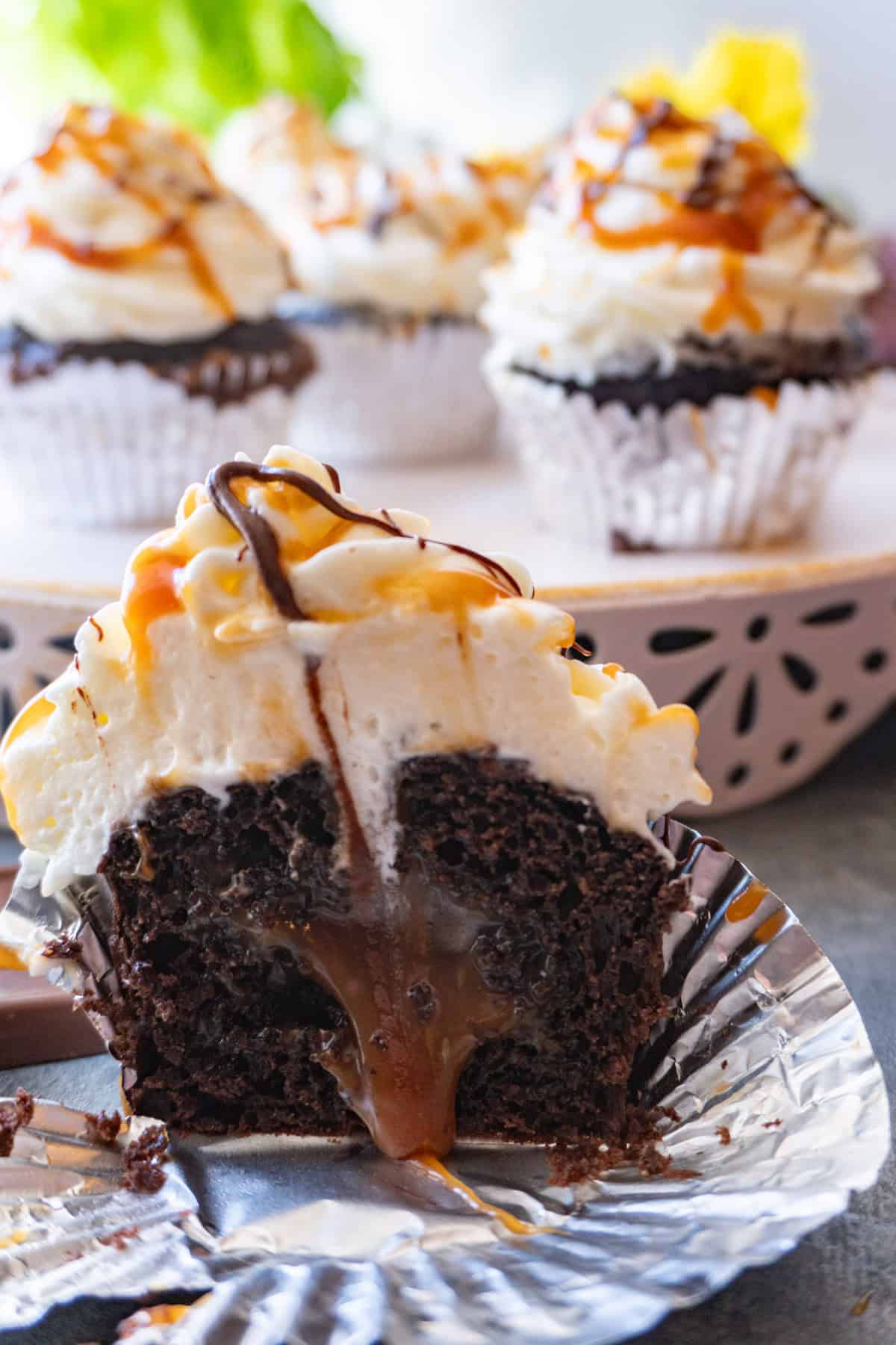 chocolate cupcake cut in half and caramel coming out