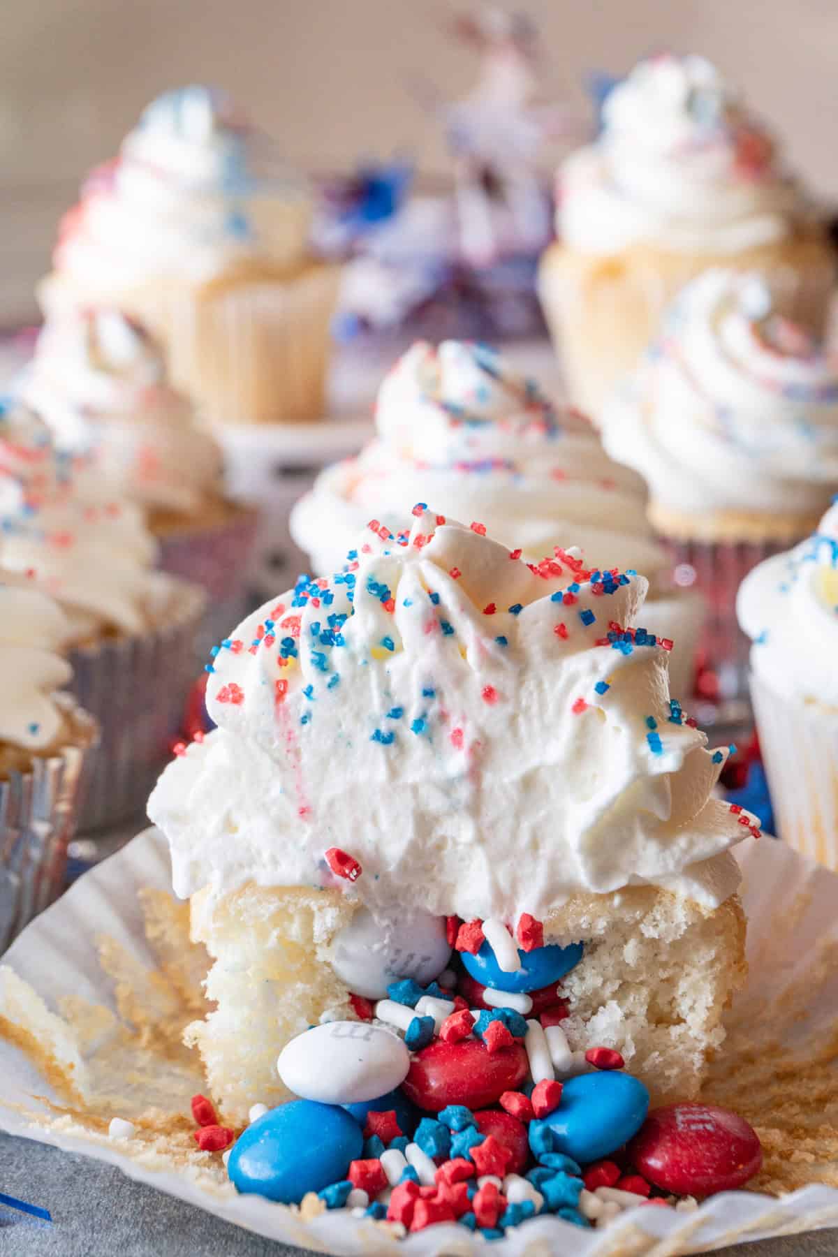 red white and blue sprinkles filled cupcake