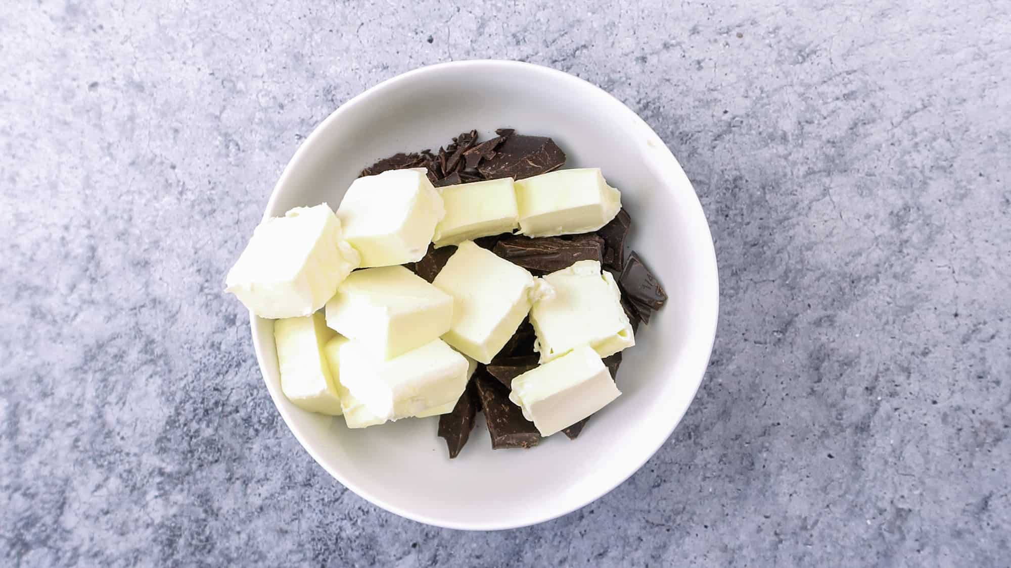 butter and chocolate before melting in bowl