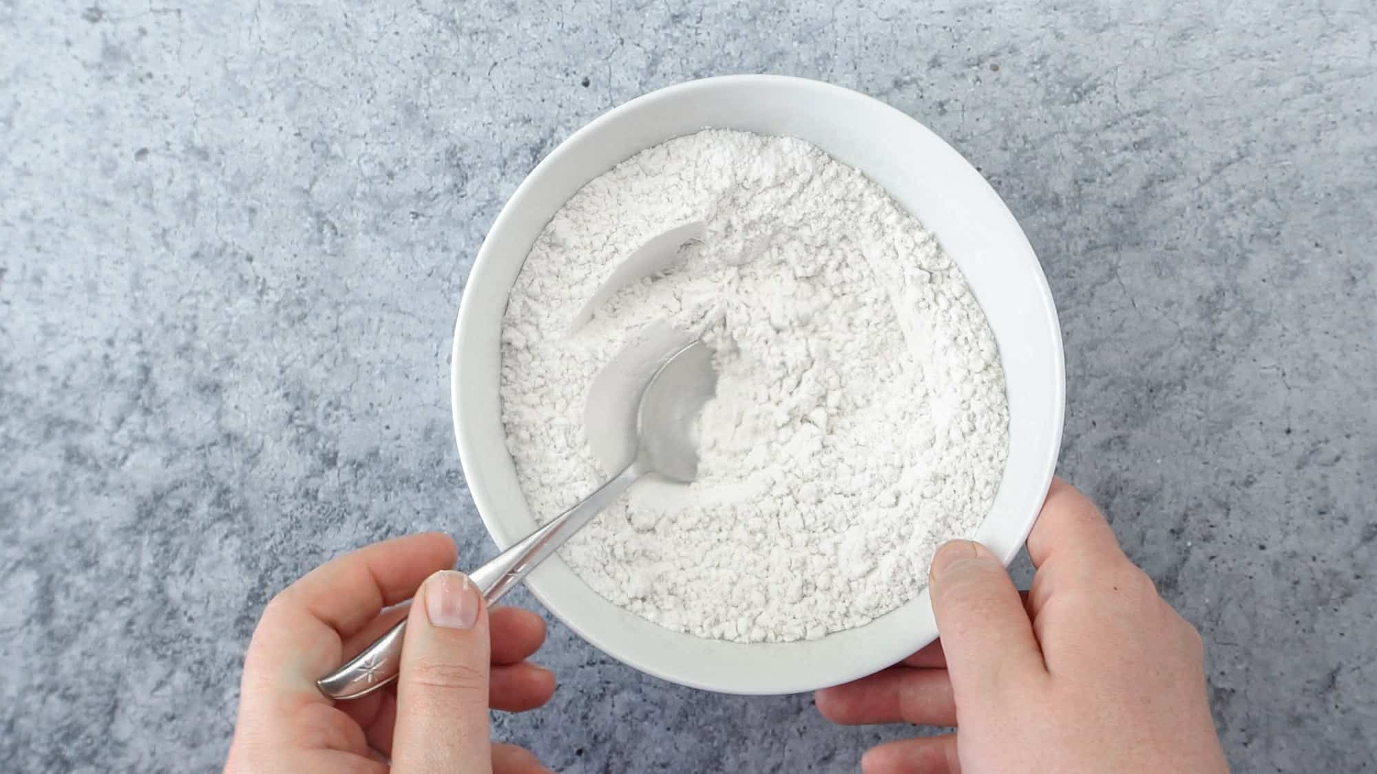 mixing dry ingredients for brownies