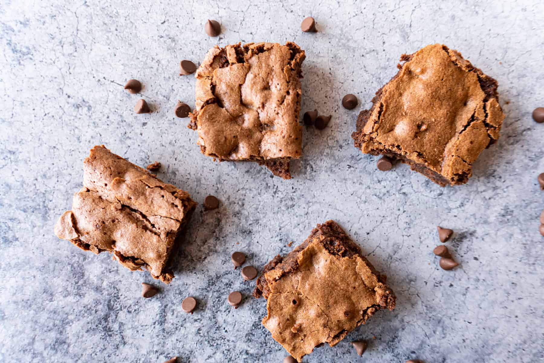 brownie pieces with chocolate chips surrounding them