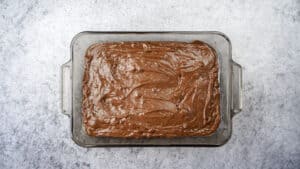 brownie batter in baking dish before baking