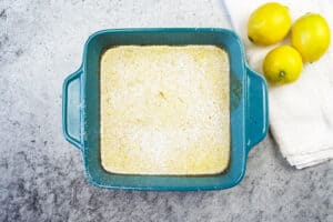 lemon bars after baking wiht powdered sugar on top