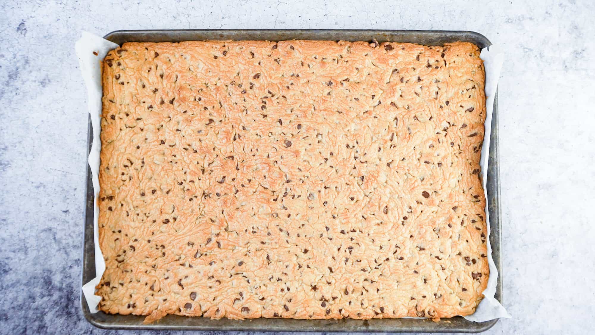 chocolate chip cookie bar after baking in sheet pan