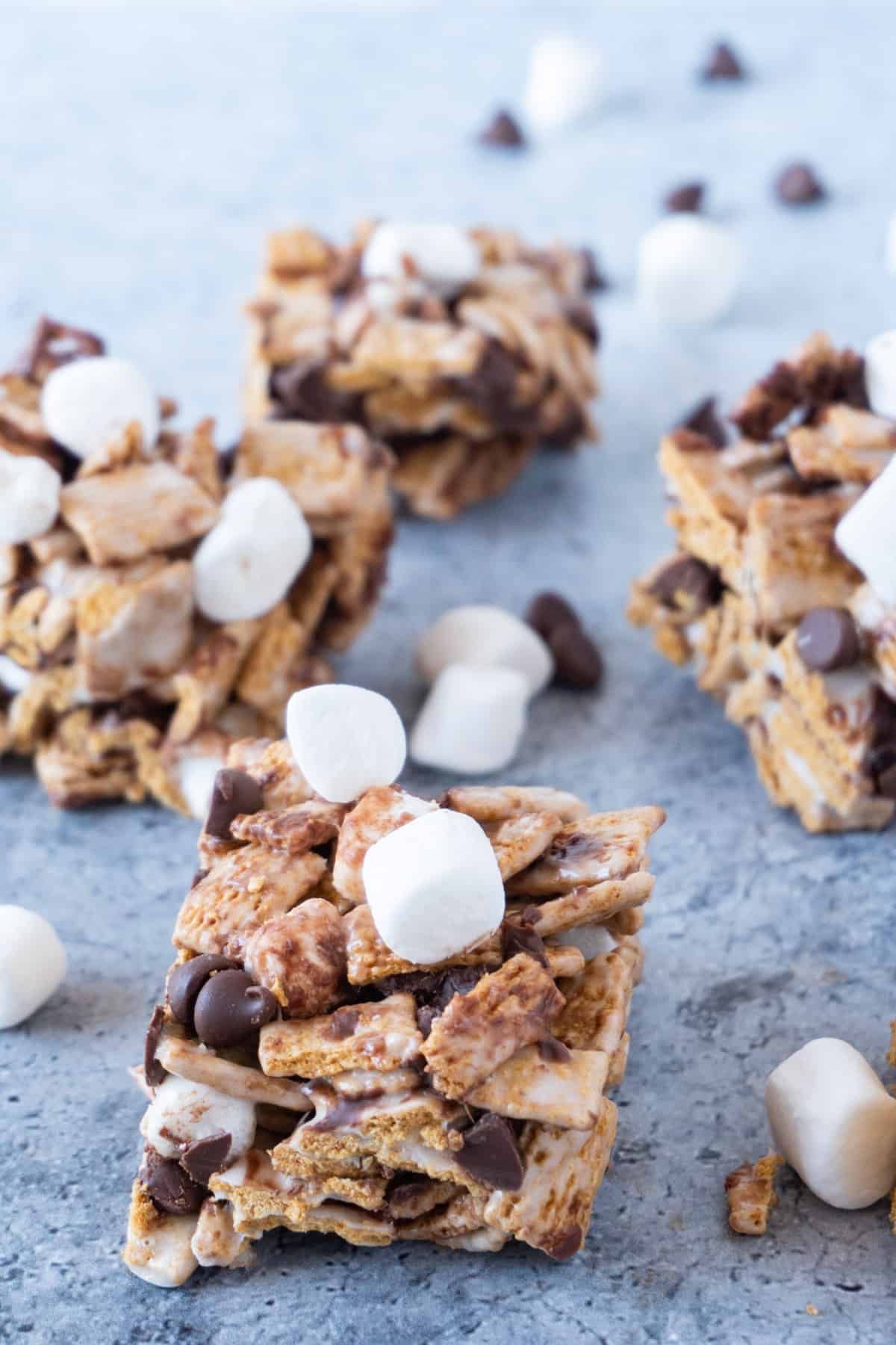 golden graham s'mores bars surrounded by mini marshmallows
